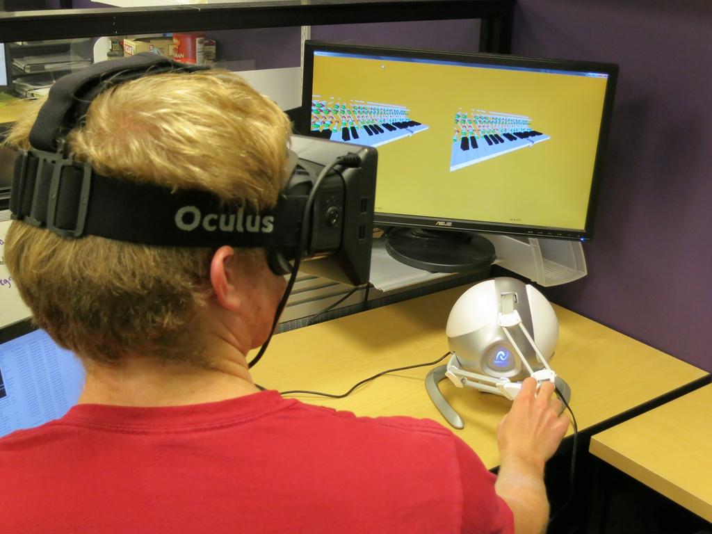 Touch Feedback in a Head-Mounted Display Virtual Reality through a Kinesthetic Haptic Device Andrew A. Stanley Stanford University Department of Mechanical Engineering astan@stanford.edu Alice X.