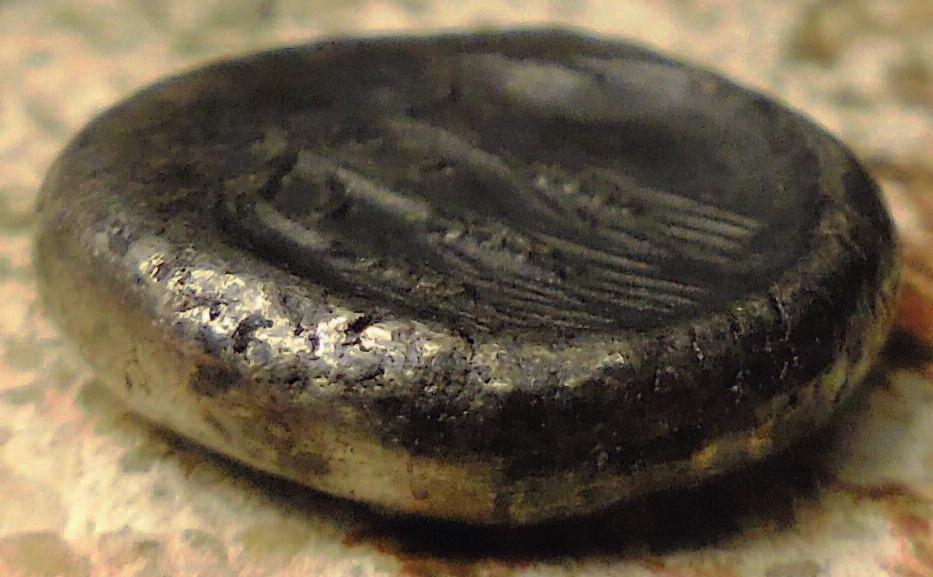 (Figures 10 and 11) If you look carefully at some ancient coins you will see an obvious raised edge on the reverse (Figure 12 and 13) and it is this lip which can grip the reverse die and make