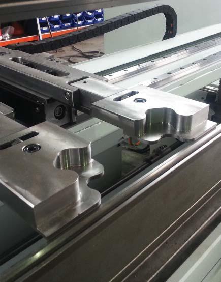 Additional outer welded steel side frame for increased machine rigidity, and minimum deformations.