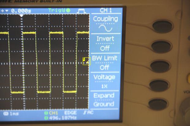 1. set trigger to center of screen Step 5: Scale Adjust volts/div, time/div, and vertical position until you frame the wave on the oscilloscope screen as shown in the first image above.