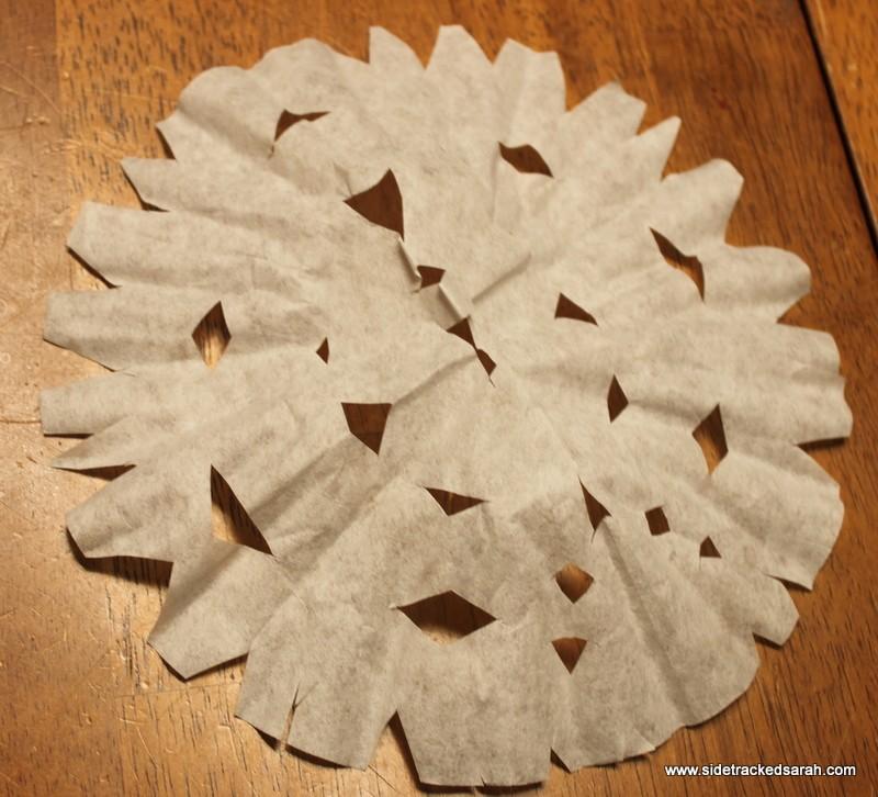 Day 11 Snowflakes Supplies: Coffee Filters Scissors Directions: Fold your coffee filters in quarters and make a few small cuts.
