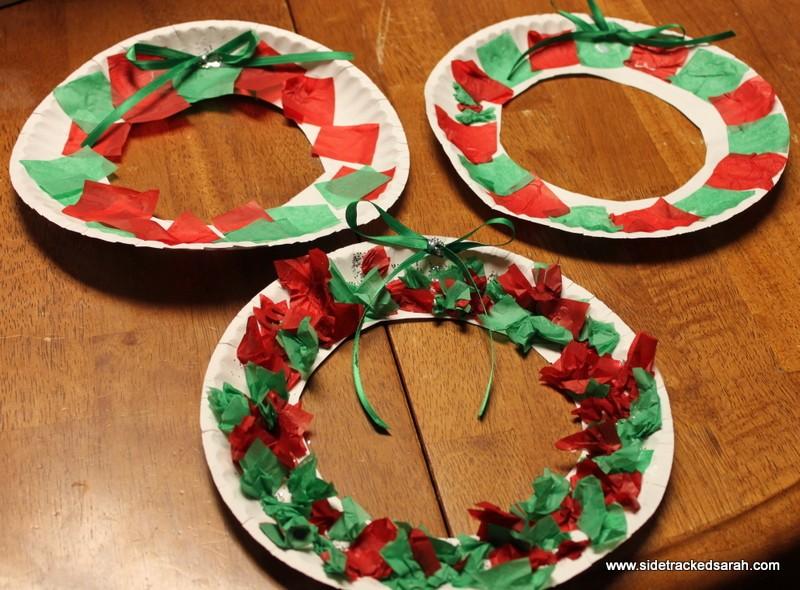 Directions: Cut the tissue paper into small squares. Cut a hole in the middle of the plate so it looks like a wreath by gently folding it over and cutting a circle out of the middle.