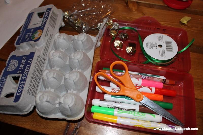 Day 14 Egg Carton Bells Supplies: Egg Carton Foil, glitter, etc. (to decorate with) Jingle Bells Markers Ribbon Directions: Cut an egg carton into individual pieces.
