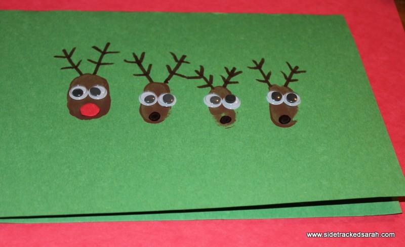 Day 19 Thumbprint Reindeer Supplies: Brown Paint Paper folded in half Brown