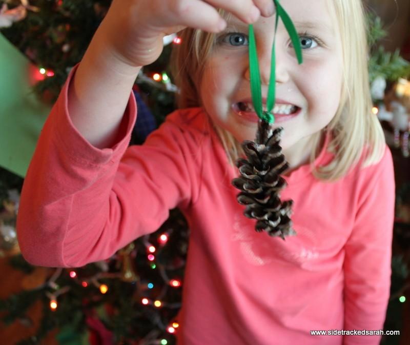 Directions: Put glitter glue on the tips of a pine cone.