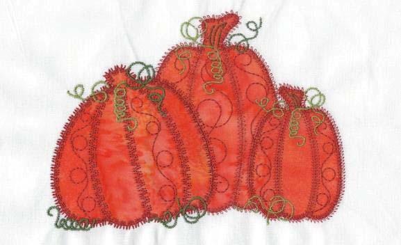 Use the block images as a reference. Four short pumpkins on four white 5" squares. Trim to 4½" squares after machine embroidery.