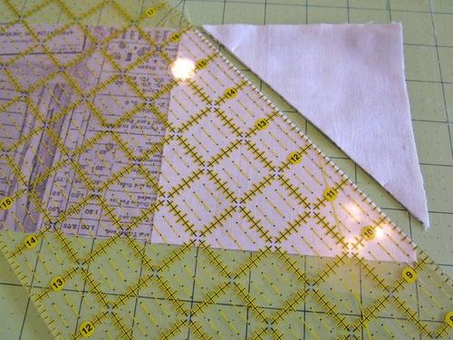 7. Press the seam as sewn, then press the corner away from the block. 8.