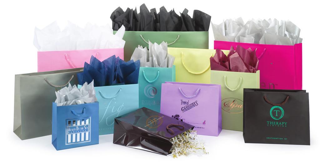 Bags are frosted high density plastic with sturdy soft loop handles and a cardboard bottom insert for stability.
