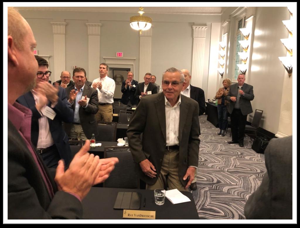 Michigan Sugar Company Director of Government Relations Ray Van Driessche is congratulated on his upcoming retirement during the winter meeting of the American Sugarbeet Growers Association held in