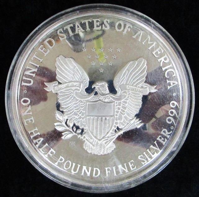 999 Fine Silver 1/2 pound coin in plastic