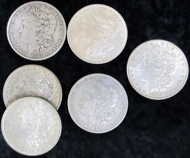 Silver dollars; 2 1890, 2 1891, 2