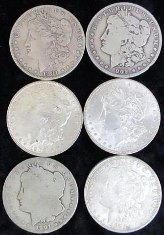 Silver dollars; 2 1878, 3 1879, 1880