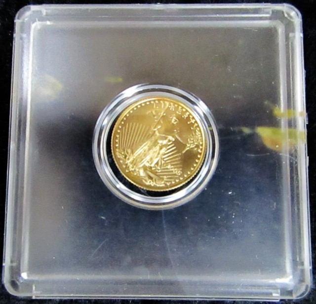 Gold $5 coin in plastic case 19803
