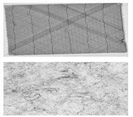 Most commercially applied units operate in the range of 100 to 400 kv. Figure 39a shows views of conventional x-ray developed for non-destructive testing of woven composites. a) b) Figure 39.