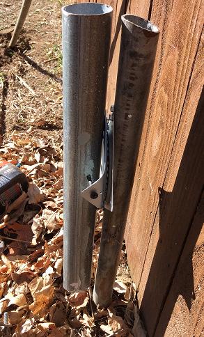The antenna can be lain over on the fencing for work here, but of course loosening the U-bolts