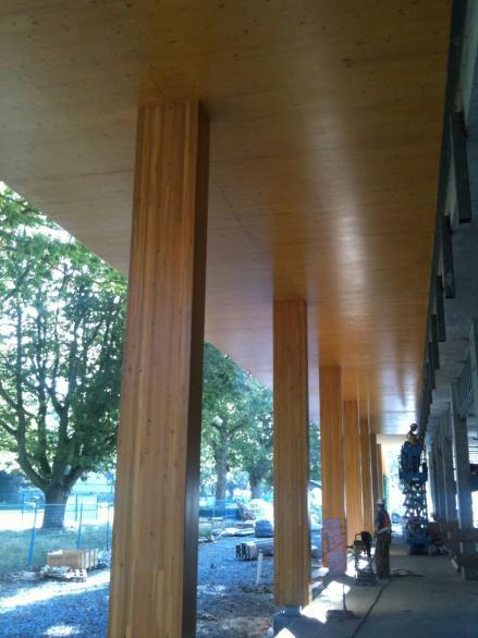 Five story hybrid wood-concrete Earth