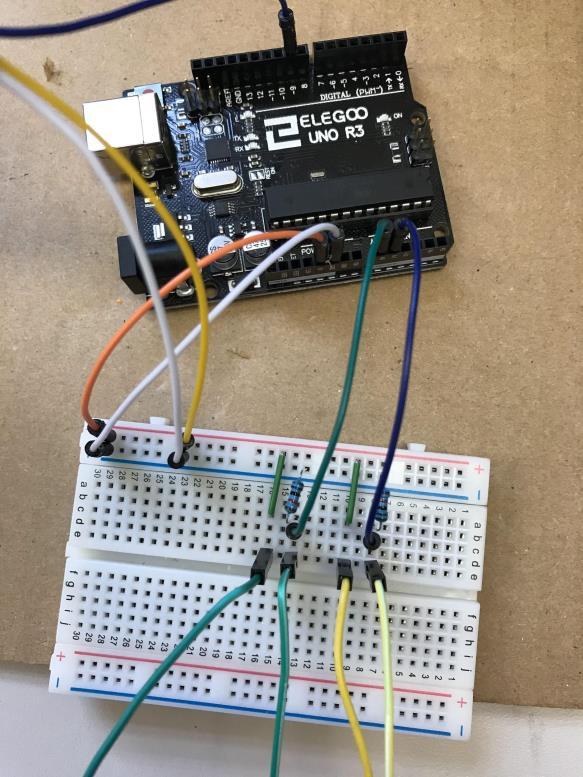 Add wires to A0 and A1 analog pins on the arduino (green and blue wires). 7.