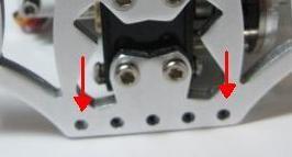 A. Now install the lower links to the Diablo chassis. Use the remaining 4 long links for this step. Insert a M3 X 20mm SHCS into the chassis were marked in the first photo.