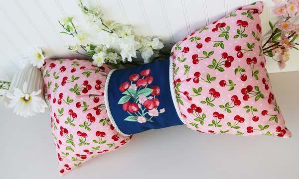 Beautiful Bow Pillow A beautiful bow pillow adds an air of elegance to any room! Pick your favorite fabric and embroidery, then follow these step-by-step instructions to make your very own bow pillow.