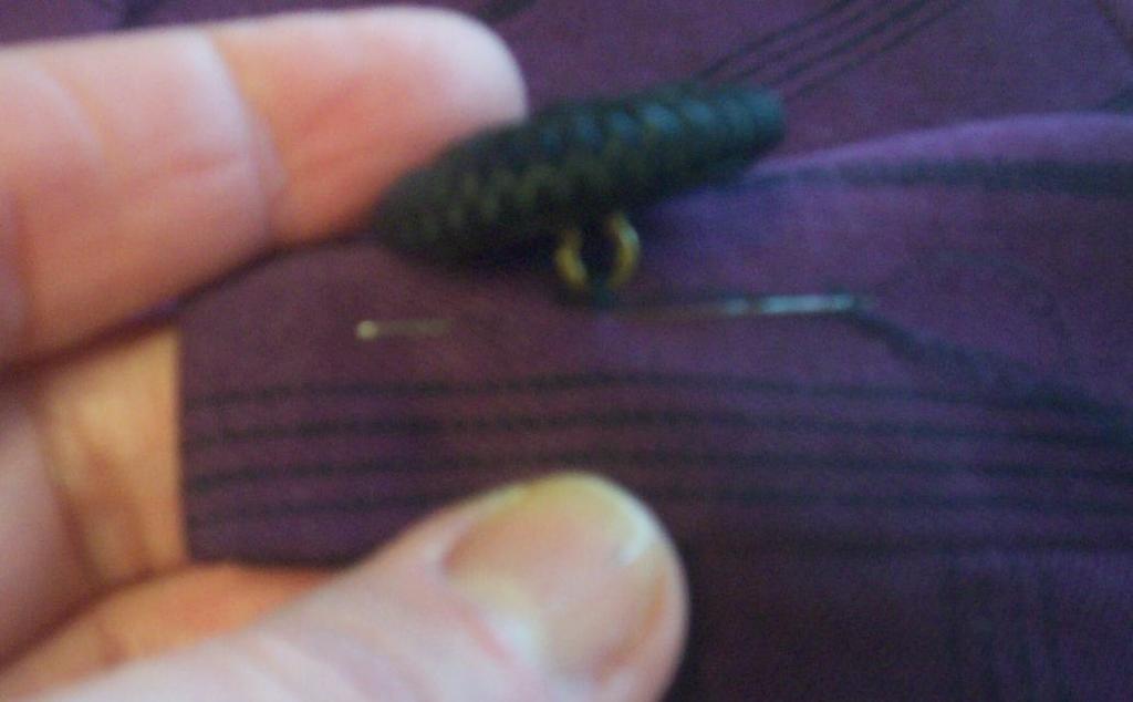 Clip your thread right against the fabric, as shown in the following