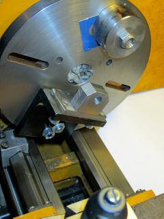 After drilling and tapping (M3) the holes in the Bearing Blocks the blocks were clamped to the jig and the jig mounted on an angle plate on the lathe faceplate, and the