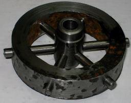 I started by making the hub of the flywheel, the end f a 16mm mild steel rod was first turned and bored to 8mm, then mounted in my