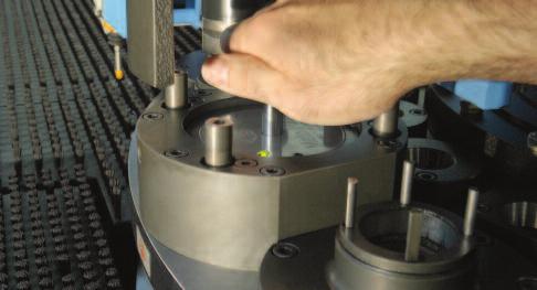 Mate Pilot Turret Calibration System Instructions Step 5 Reach into the machine and tighten the adjustment handle using the T-bar until the interlocking teeth of the upper and lower instruments are