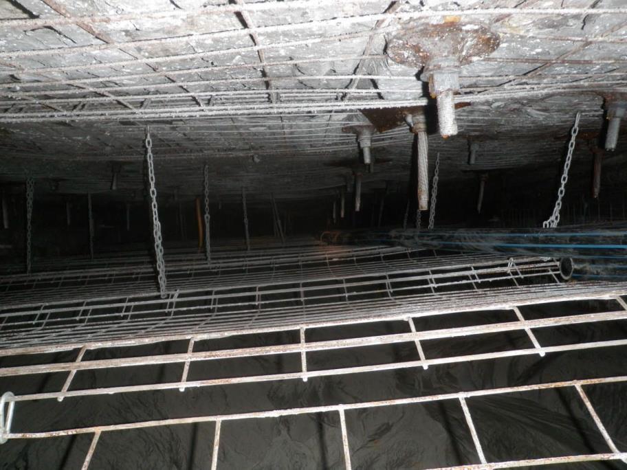 Figure 8: Photo of roof mesh hung to create false roof in PDRR21 The monitoring regime implemented for PDRR 21 had three main components (Figure 9): 5 hydraulic stress
