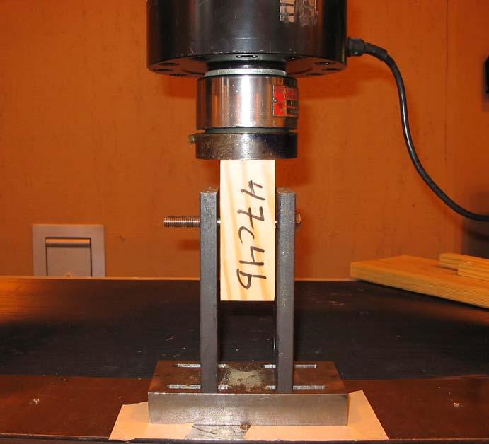 Figure 3.16: Dowel Embedment Test Setup The load was applied in compression to the end of each specimen by an MTS testing machine and the loading head depicted in Figure 3.17.