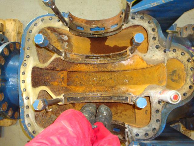 1. One half of the pump housing, before sur- face preparation. 2. 2. Internal bi-metallic corrosion in the supporting seat zones.