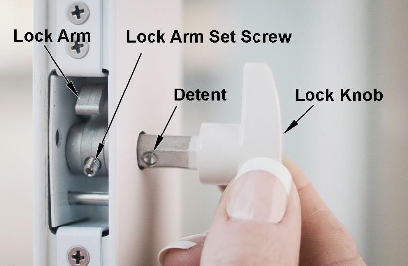 ) and so that one of the detents in the Lock Handle shaft aligns with the Lock Arm Set Screw.