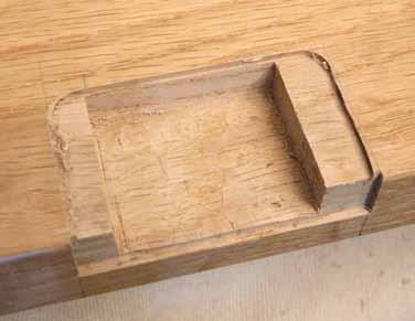 23 ultra-fine lines recess depth to a smidgeon over the thickness of the body plus the back plate (Pic.12). If using a router the lock itself can be used to set the depth stop (Pic.13).