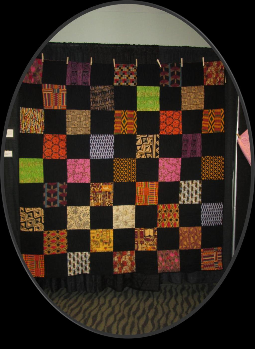 Quilt by Carol Logan Patitu This quilt is made of various African patterns. I made the quilt while living in Texas in the 1990s.