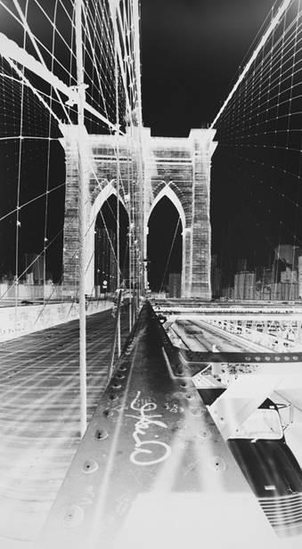 Vera Lutter, Brooklyn Bridge, unique gelatin silver print, June 11, 2015 About Vera Lutter For Vera Lutter (b. 1960), New York is a recurring subject in her photographs.