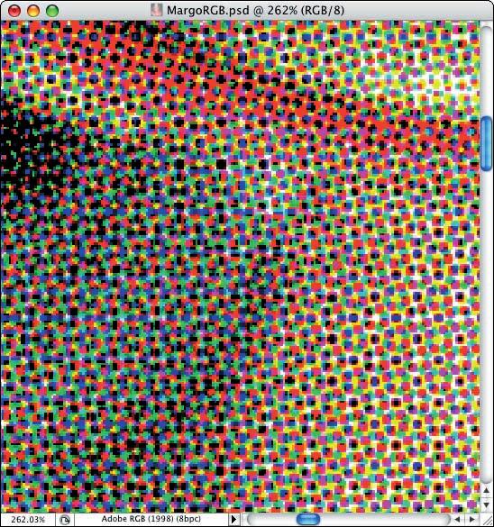 102640 ch03.1.qxp 3/2/07 3:47 PM Page 77 Understanding Color Modes 3 FIGURE 3.15 A close up of dots of CMYK ink printed on white paper.