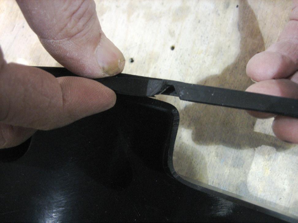 Applying the adhesive side of the edge trim to the inner side of the flare, affix the edge trim to the top edge of the flare (the portion that comes in contact with