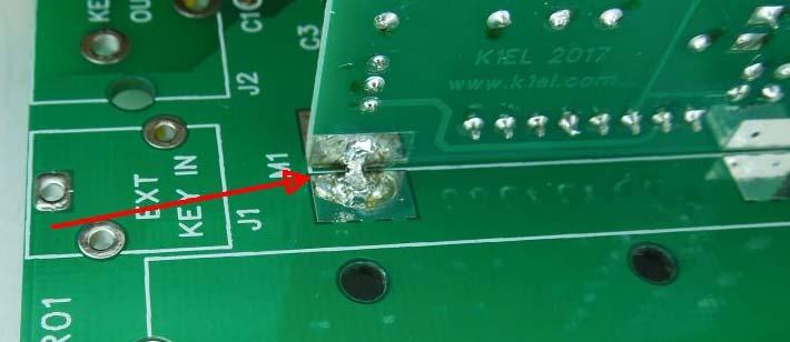 When you are satisfied with your work, solder the remaining 7 pins and trim off the excess leads. Now we will bond the two boards together with solder bridging.