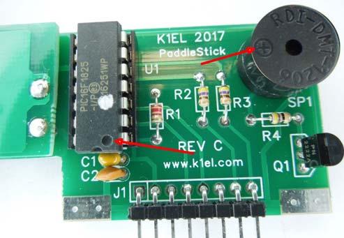 It s easier to install ICs if the leads are straight, carefully straighten them as shown in the left picture. The silver dot on U1 signifies that the part has been programmed.