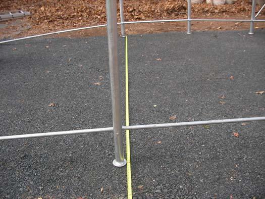 the ground. Adjust each leg before securing to ground so that bottom cross rails are level. Measure frame width across from outside to outside of frame members.
