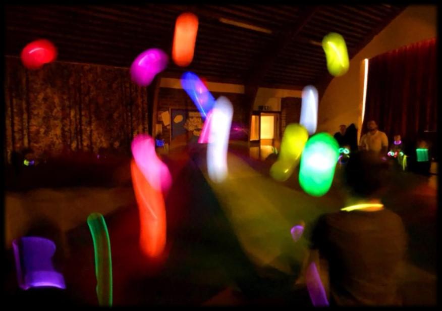 Parachute LED Balloons (roughly 8 for 15) With your room now lit up with your young people wearing their glowsticks, you should be able to turn off your lights and play these games in the dark.