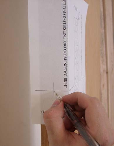 Step 2: Cutting Opening in the Door Place the folded template on the face of the door, as shown to the