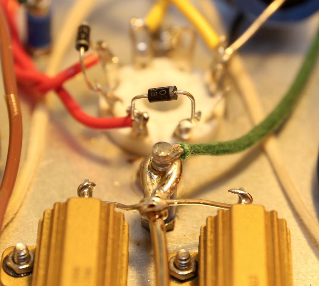 47. Solder an ultra fast diode UF 4007 (RD10) between pins 5 and 4 on the center most tube