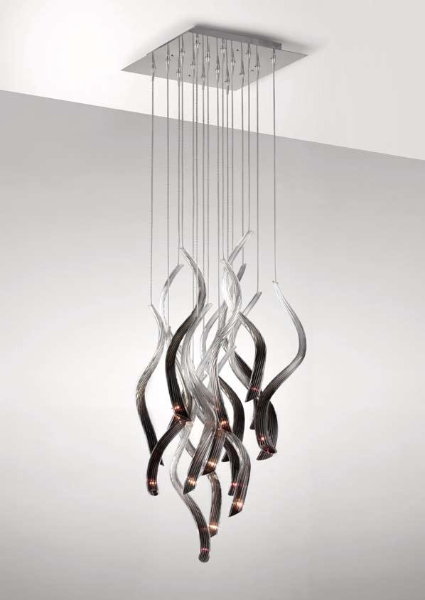 Trasformatore incluso. Suspension lamp and wall lamp with twisted blown glass diffuser in several colours.
