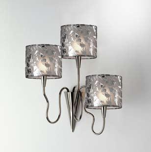 black nickel metal structure. Lamp shades in silk with silvered plated accents.