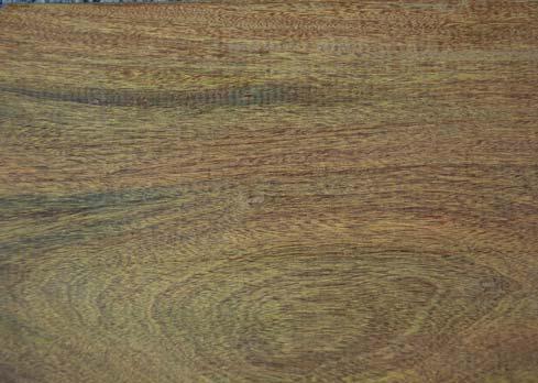 Ipe is often referred to as Brazilian Walnut. The wood is olive brown to dark brown in colour with reddish tints and distinctive light and dark marbling or striping.