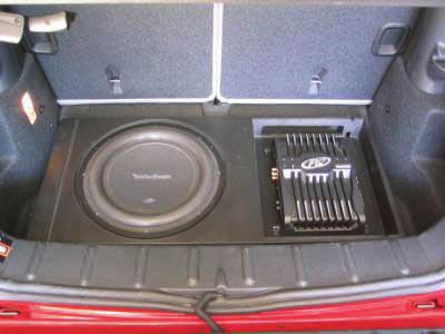 Mount the Amplifier - Mount your amplifier in the amplifier rack. It is advisable to test fit the amplifier into the enclosure with the enclosure in the car before actually mounting it.