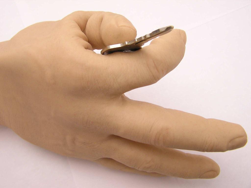 68 Finger 5.5 Pinch grasp with glove, two The grasps developed look natural can hold objects securely. The cylinder shown in Figure 5.