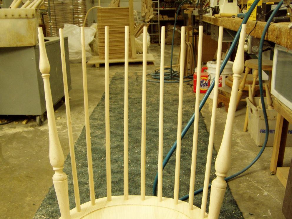 Glue and install the side post first, then flip the chair over and wedge the side post perpendicular