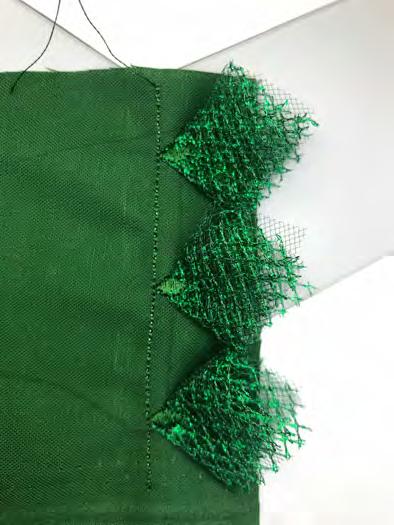 Creating the Tree: 1. Select the plain horizontal pop-up dimensional stitch. 2. Trace the Tree Template (text side up) onto the green fabric using your fabric marking pen. 3.