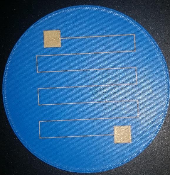 Figure 5: Micro-Dispensed Conductive Paste on 3D Printed Substrate This benefits PCS greatly as printing the electronics portions requires a smooth surface for conductive material to be dispensed.
